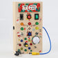 Montessori Busy Board Sensory Toys Wooden with LED Light Switch Control Board Travel Activities Kids Games for 2-4 Years Old